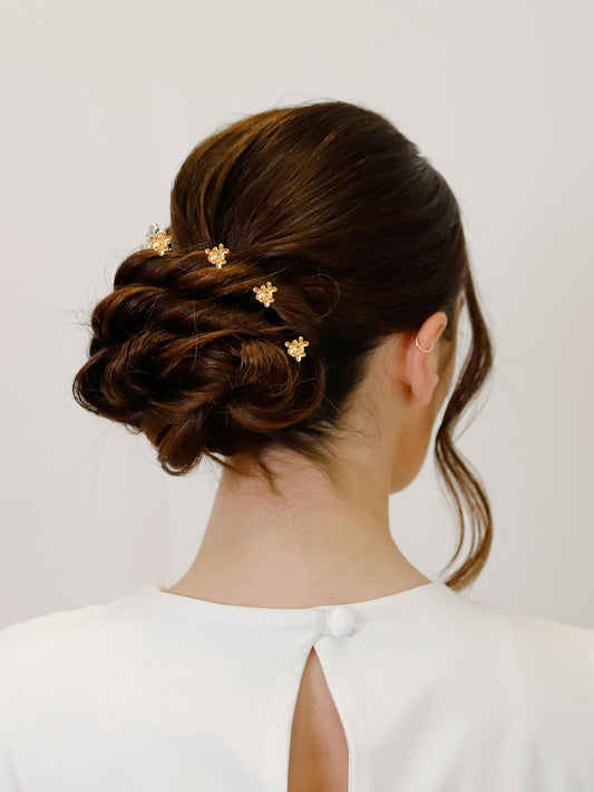 chignon orné de pics à cheveux doré