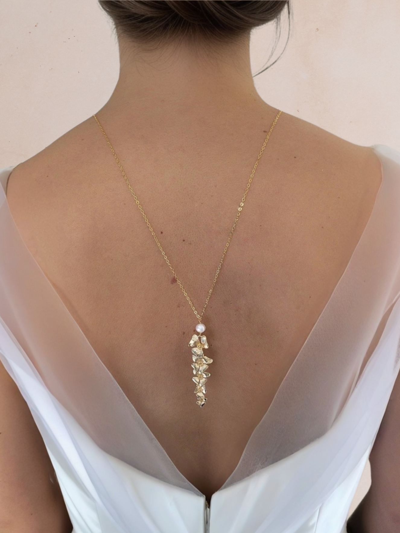 collier de dos mariage doré