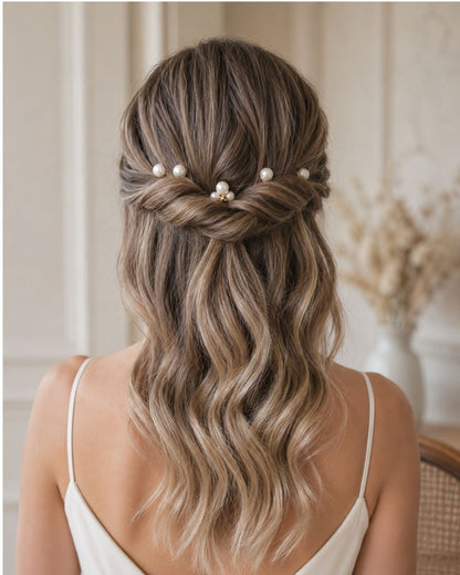 coiffure mariée avec pics à chignon en perle