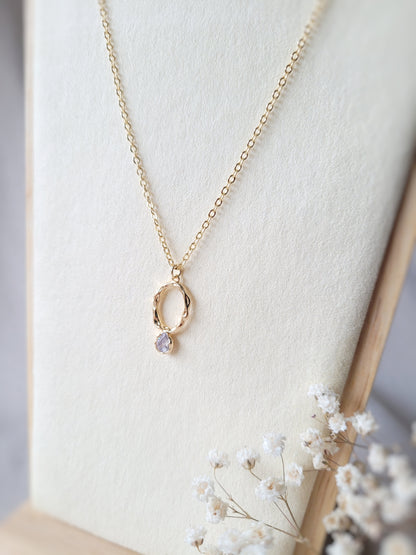 collier cercle ovale doré en laiton et zircon clair