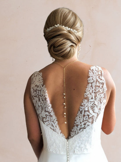 bijoux de dos élégant et raffiné petites fleurs pendantes