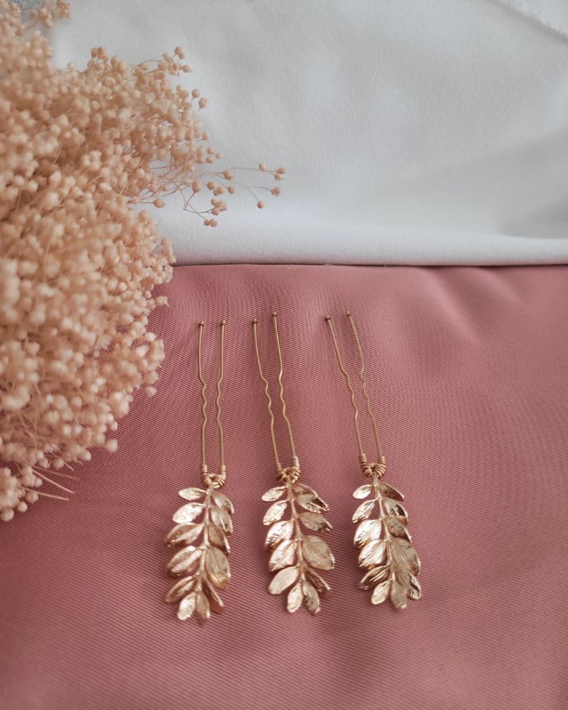 pics à cheveux feuilles dorées