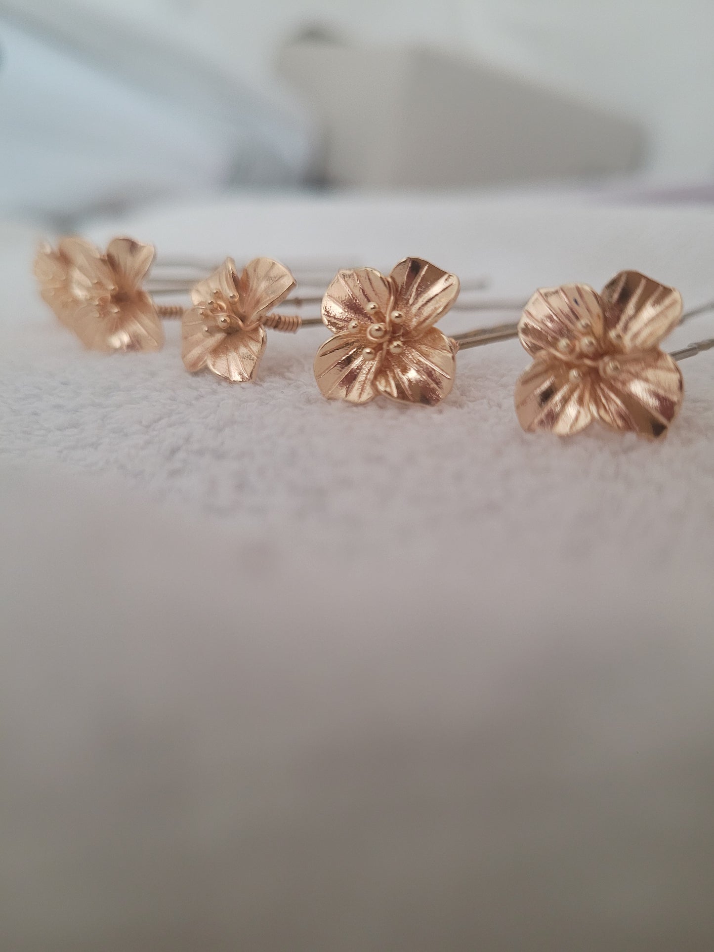 Pics à cheveux fleur dorée MIA
